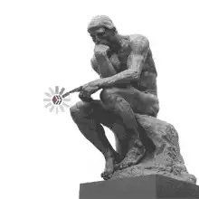 The Thinker holding a loading spinner