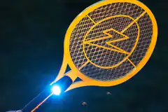 yellow electric bug zapper racket with light