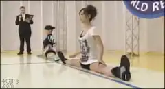Girl does splits and falls over