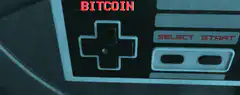 Hand playing Bitcoin NES controller