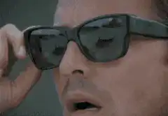 Tony Stark puts on sunglasses