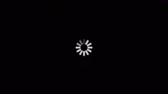 Spinning loading icon on black background