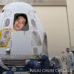 Man pops out of spaceship window