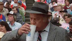 George Burns eating cake