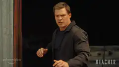 Jack Reacher raises hands in surrender