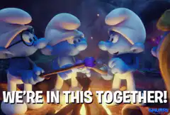Smurfs roasting marshmallows together