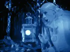 Blue-tinted scene with a ghost and a girl