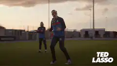 Ted Lasso dancing on soccer field