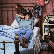 Boy wakes up in bed