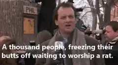 Bill Murray freezing waiting to worship a rat