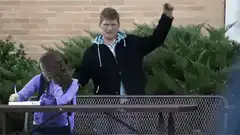 Guy dances then runs away from girl