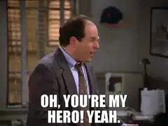 George Costanza hugs Kramer saying you're my hero