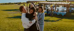 Ben Stiller hugs Owen Wilson at a wedding