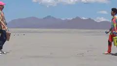 Two lines of people high-fiving