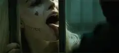 Harley Quinn licking prison bars