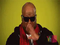 Puff Daddy shrugging and pointing