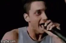 Eminem singing into microphone