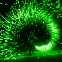 person spinning green sparks