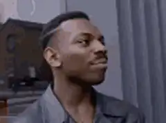 Man taps head thinking