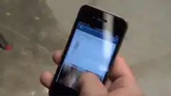 Hand scrolling on smartphone