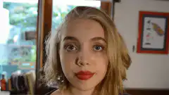 Girl puts on headphones and falls asleep