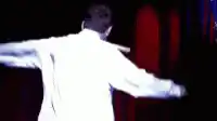 Man with knife in mouth juggling