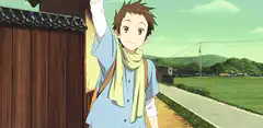 Boy waving and pointing at a wooden gate