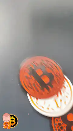 Stirring coffee on a bitcoin coaster