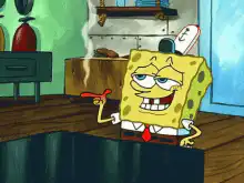 SpongeBob holding a red object with a smug grin