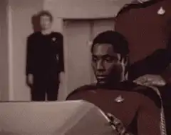 Uhura screams in horror