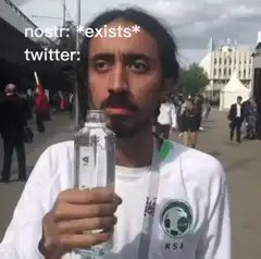 Man drinking water with nostr exists text