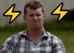 Man squinting with lightning bolts