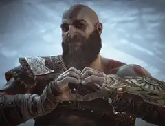 Kratos makes a heart shape with his hands