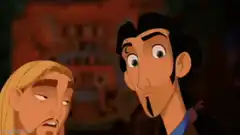 Chuy and Tulio looking at each other with GM text