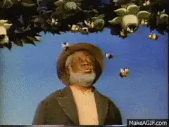 Man looking at bees on his finger