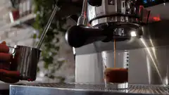 espresso pouring into glass