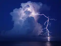 lightning strike over ocean