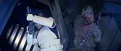 Han Solo and Chewbacca shooting blasters