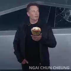 Elon Musk holding a muffin