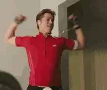 Brad Pitt dancing in red shirt