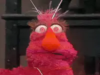Elmo with hypnotic eyes