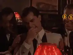 Tom Cruise laughing with laser eyes