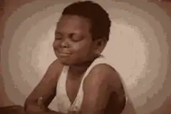 Laughing boy facepalm