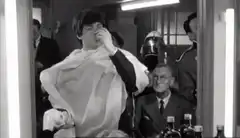 Paul McCartney makes a funny face in the mirror