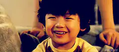kid stops smiling
