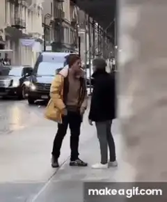 Two men fist bump and explode