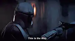 The Mandalorian deflects a lightsaber