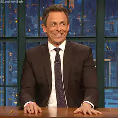 Seth Meyers Smiling and Gesturing