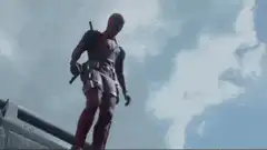 Deadpool falls onto a car