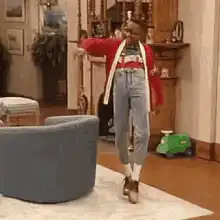 African American woman dancing in living room